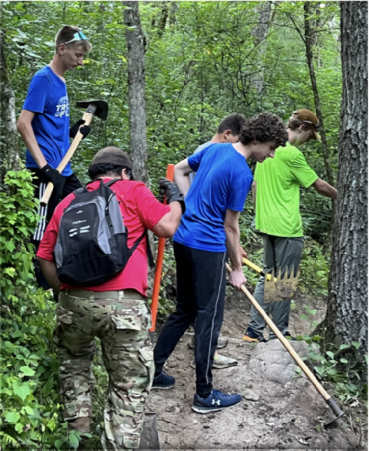 196MTB riders working on trail at Lebanon Hills